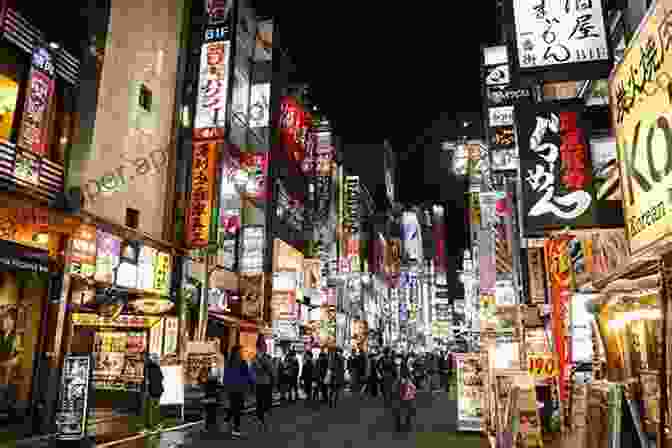 A Bustling Tokyo Street At Night With Neon Lights And People Tokyo Travel Guide With 100 Landscape Photos