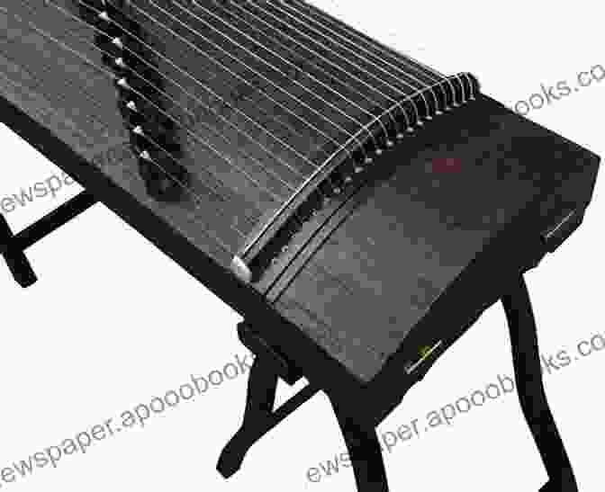 A Close Up Of A Guzheng, A Chinese Zither, With Its Strings And Soundboard Visible. How To Play Guzheng The Chinese Zither: The Basic Skills