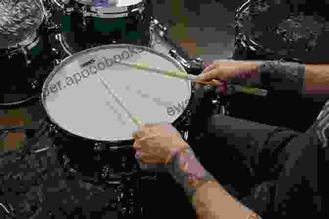 A Drummer Demonstrating Proper Drum Technique Playing Garrahand Drum: Know Skills Needed To Play The Garrahand Drum: Ways To Improve Your Garrahand Drum