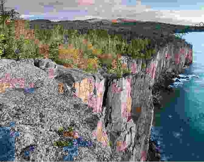 A Hiker Gazes Out Over The Vast Expanse Of Lake Superior From A Scenic Trail. Hiking In Ontario S Multi Regional Trails