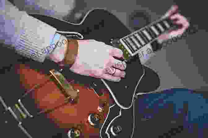 A Photo Of A Guitarist Playing A Fusion Guitar. Tapping Discovered: A Fresh Approach For Guitar Players Of Rock Metal Funk Country Fusion Styles