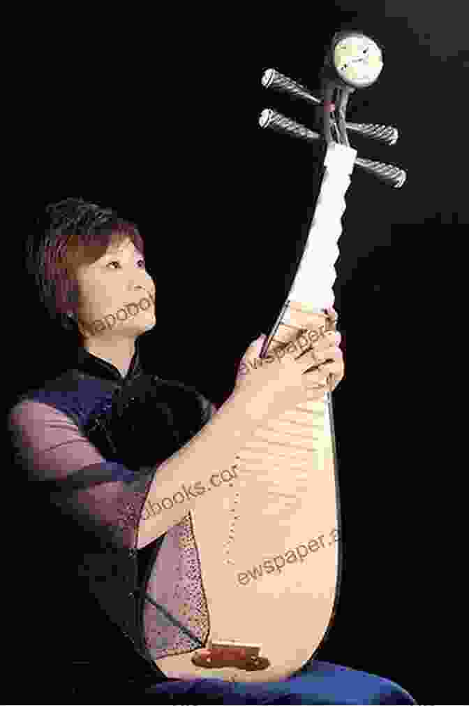 A Pipa Player Performing On Stage How To Play Pipa The Chinese Lute: The Basic Skills