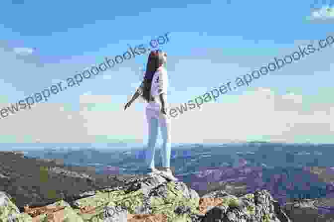 A Young Woman Standing On A Mountaintop, Looking Out At A Vast Landscape This Freedom Journey (The Mountain 8)