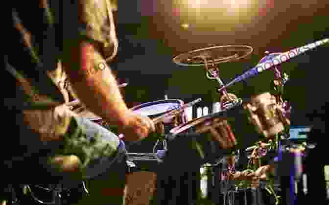 An Image Of A Drummer Playing In A Band With Other Musicians On Stage. Bang On Time: A Guide For The Beginning And Advancing Drum Student