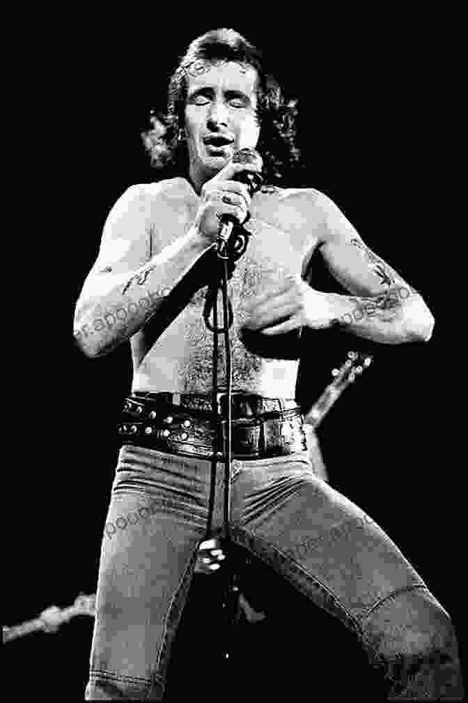 Bon Scott Performing Live, Captivating The Audience With His Electrifying Energy. Bad Boy Boogie: The Adventures Of Bon Scott